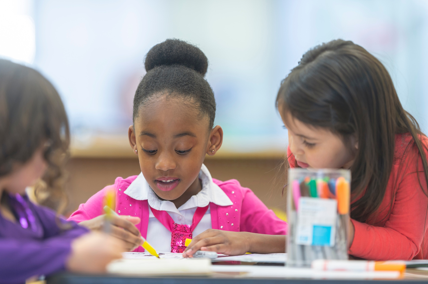 Kids coloring together